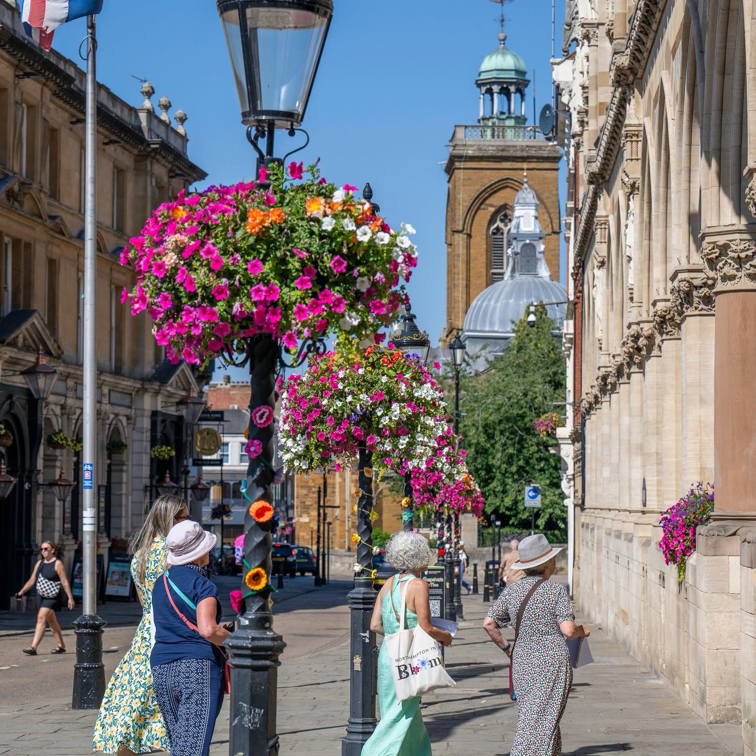 Npton in bloom outside Guildhall
